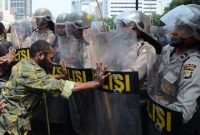 Kelompok Bersenjata Papua Ambil Uang Pada Pendulang Timah